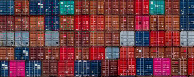 stack-of-logistics-container-cargo-and-shipping-b-2023-11-27-05-09-30-utc
